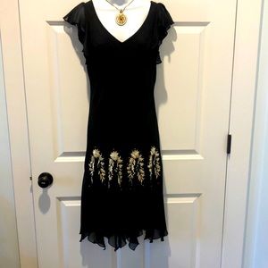 LBD with lavish bandanna style bottom. Size medium.